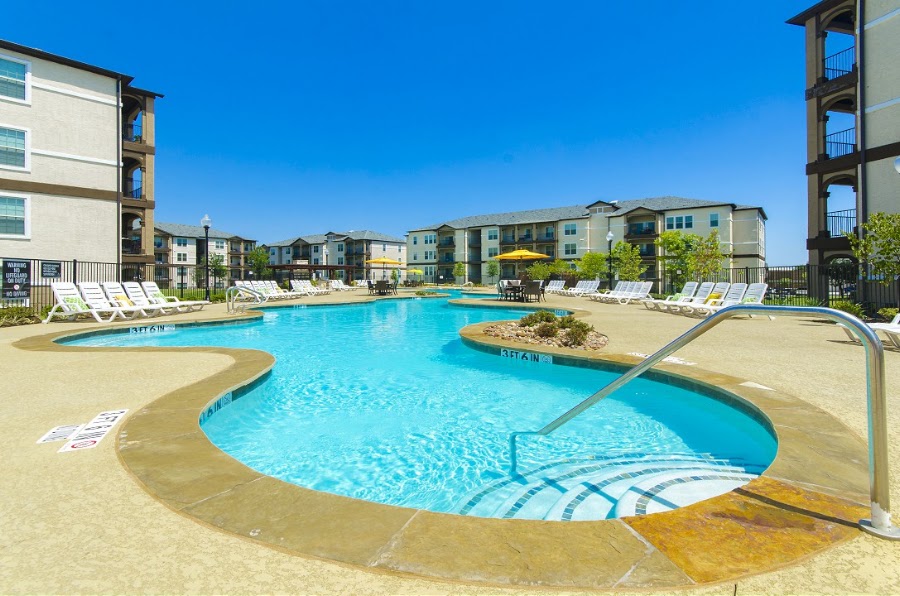 Olympus Woodbridge apartments at 7700 Cody Lane, Sachse, TX