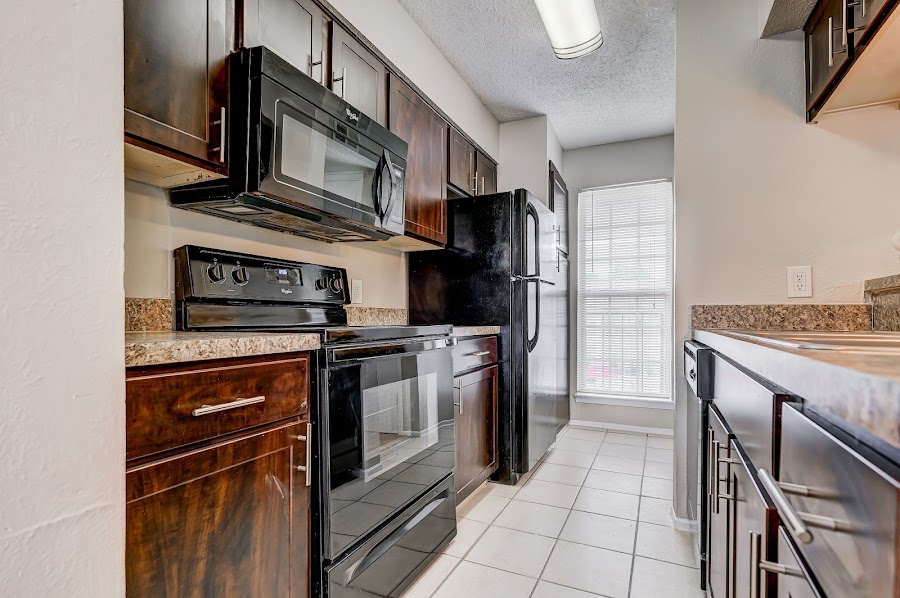 Grand Seasons apartments at 6069 Belt Line Rd, Dallas, TX