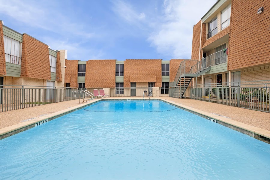 Woodside Villas apartments at 3429 W Rochelle Rd, Irving, TX